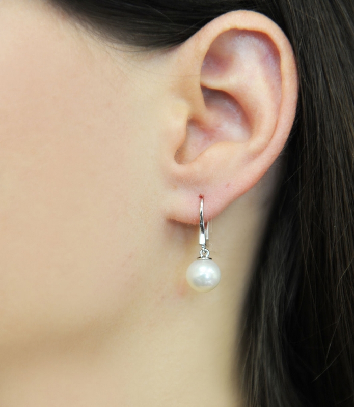 Model is wearing Elegance earrings with 9-10mm AAAA quality pearls