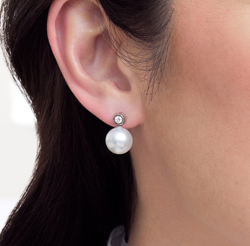 Model is wearing Dakota earrings with 11-12mm AAAA quality pearls