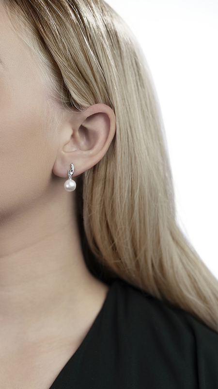 Model is wearing Lois earrings with 9mm AAAA quality pearls