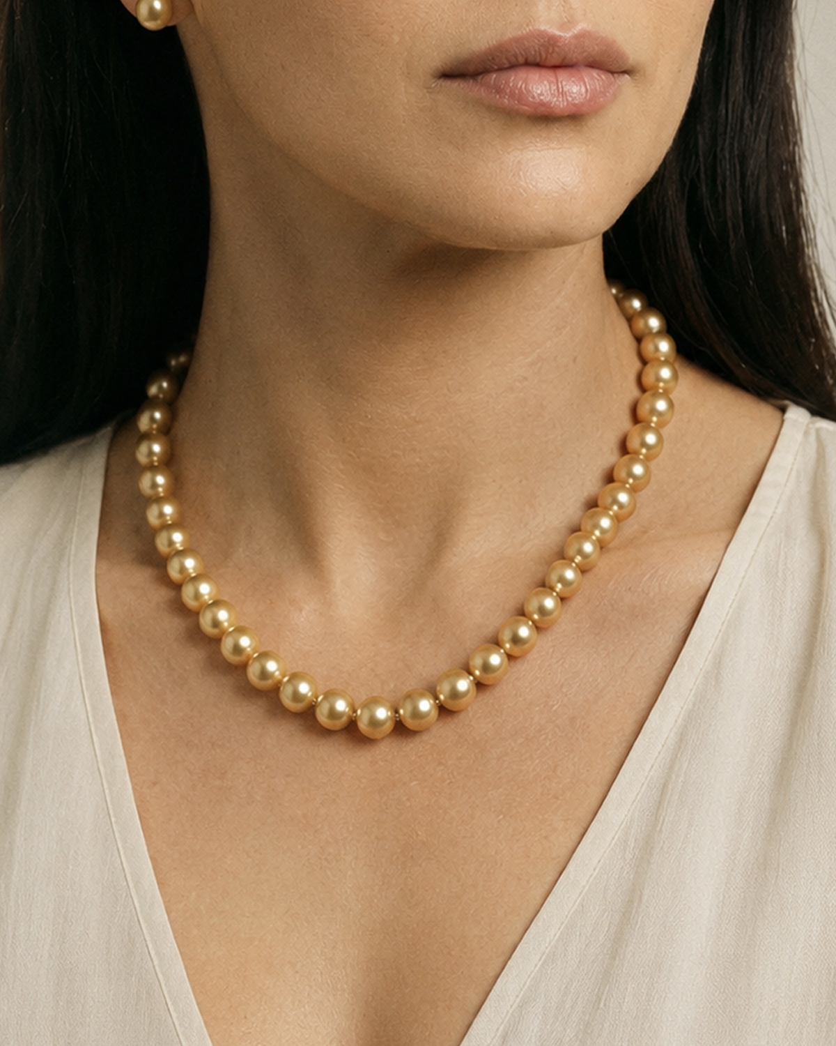 12-14mm Golden South Sea Oval Pearl Necklace - AAAA Quality - Model Image